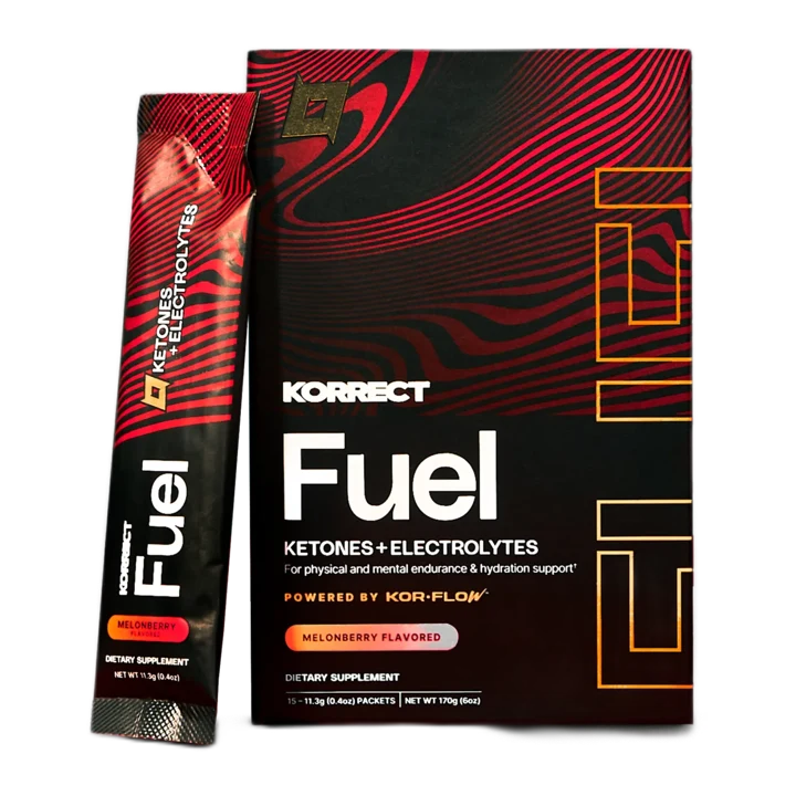 A box of Korrect Fuel next to a single Melonberry flavored stick pack
